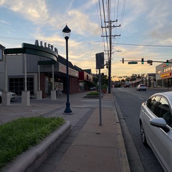 Punta Cana - a white car parked on the side of the road - Dominican Near Me - Pikesville, Maryland