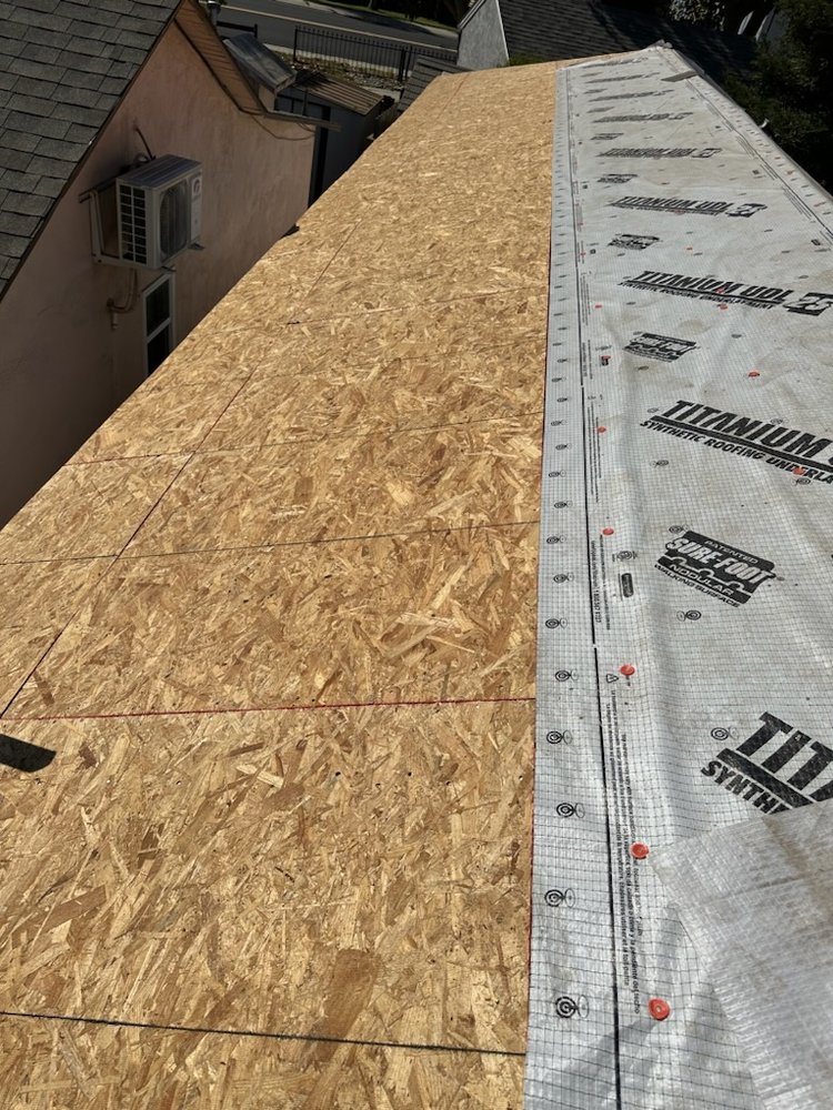 Slide of Zaguilan Roofing Service