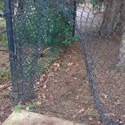 its a huge hole in the fence near the MAX line that's been here my entire tenancy. You could push a wheelbarrow through it if you wanted to.