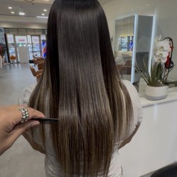 Xinyu Hair Salon - Hair straightening by johnny. Magic sleek
