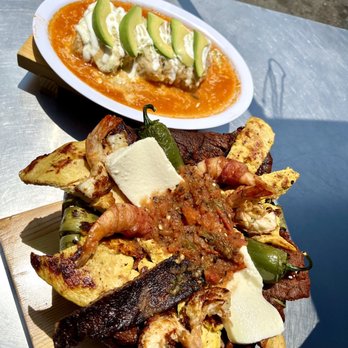 Cuernavacas Grill - Molcajete for 2 and Chile relleno Wet Burrito - Mexican Near Me - Los Angeles, California Cuernavacas Grill - Molcajete for 2 and Chile relleno Wet Burrito - Mexican Near Me - Los Angeles, California