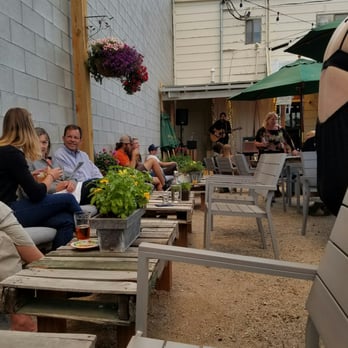 Proprietress - Back patio with music - Beer, Wine & Spirits Near Me - Cody, Wyoming Proprietress - Back patio with music - Beer, Wine & Spirits Near Me - Cody, Wyoming