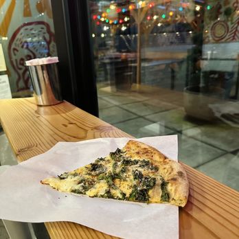Pizza Thief - Seasonal pizza with raab, Meyer lemon, green garlic, Calabrian, fresh mozzarella, provolone. SO GOOD. - Pizza Near Me - Portland, Oregon Pizza Thief - Seasonal pizza with raab, Meyer lemon, green garlic, Calabrian, fresh mozzarella, provolone. SO GOOD. - Pizza Near Me - Portland, Oregon