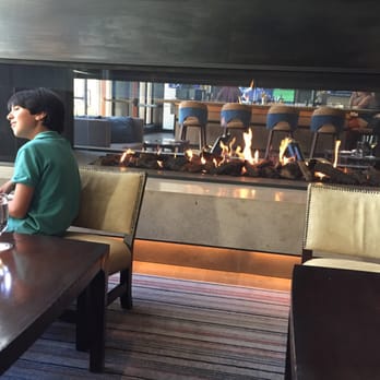 Four Seasons Resort and Residences Vail - Lounge fireplace - Residences Near Me - Vail, Colorado