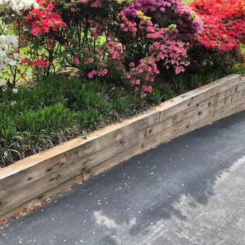 MDR Landscaping & Tree Service - Retaining wall along steep driveway - Tree Services Near Me