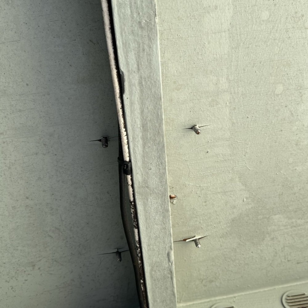 J&E ROOFING - Before - screws through roof from satellite mounting. - Roofing Near Me - Waianae, Hawaii J&E ROOFING - Before - screws through roof from satellite mounting. - Roofing Near Me - Waianae, Hawaii