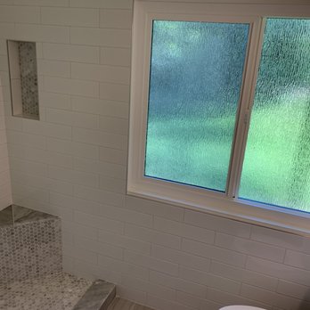 VP Design & Construction - Vinny includes bench and niche. Tile now wraps around window and toilet. - General Contractors Near Me VP Design & Construction - Vinny includes bench and niche. Tile now wraps around window and toilet. - General Contractors Near Me