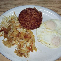 Monroe Family Restaurant - Fried corn beef hash w/ over easy eggs and delicious hash browns