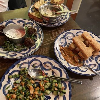 Extra Virgin - Cucumber salad, Chickpea Fries, grilled bread and Grilled Bread & Ricotta - Tapas/Small Plates Near Me - Kansas City, Missouri Extra Virgin - Cucumber salad, Chickpea Fries, grilled bread and Grilled Bread & Ricotta - Tapas/Small Plates Near Me - Kansas City, Missouri