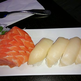 Ginza - Salmon sashimi - limit 6 pieces per person. White tuna nigiri sushi on right - Sushi Bars Near Me - Sarasota, Florida Ginza - Salmon sashimi - limit 6 pieces per person. White tuna nigiri sushi on right - Sushi Bars Near Me - Sarasota, Florida