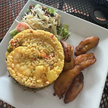 La Parrilla - Pina rellena de arroz con camarones - Latin American Near Me - Luquillo, Puerto Rico La Parrilla - Pina rellena de arroz con camarones - Latin American Near Me - Luquillo, Puerto Rico