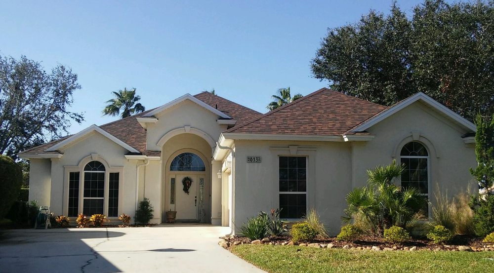 Slide of J Adams Roofing