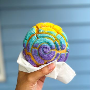Panaderia Jalisco Bakery - a hand holding a pastry - Bakeries Near Me - Riverside, California Panaderia Jalisco Bakery - a hand holding a pastry - Bakeries Near Me - Riverside, California