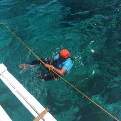 Acqua Dive - Staff preparing the boat so that we can start snorkeling.