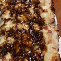 BBQ Chicken Pizza with Bacon and Onion added.