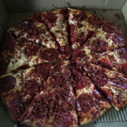 Stackhouse Pizza Sub and Poutinere - Large pepperoni and bacon pizza