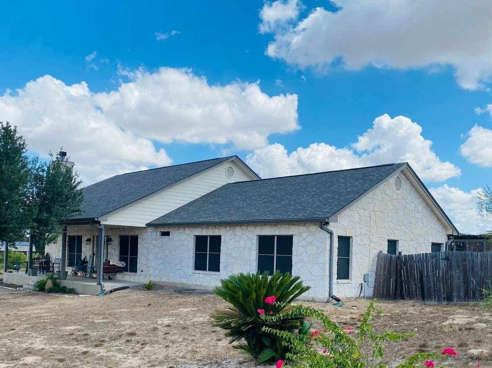 Slide of Tinsley Roofing