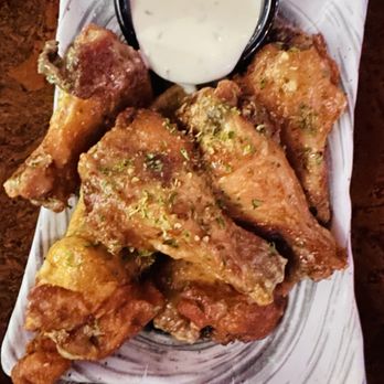 Twice Removed - Twice removed garlic parm wings - Cocktail Bars Near Me - Fort Lauderdale, Florida Twice Removed - Twice removed garlic parm wings - Cocktail Bars Near Me - Fort Lauderdale, Florida