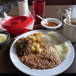 Huevos rancheros with Barbacoa salsa on the side