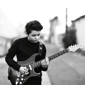Garrett Podgorski - Andrew Diaz on his Fender Stratocaster. - Musical Instruments & Teachers Near Me Garrett Podgorski - Andrew Diaz on his Fender Stratocaster. - Musical Instruments & Teachers Near Me