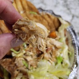 Big dry chunks of chicken with no seasoning or sauce. Big dry chunks of chicken with no seasoning or sauce.