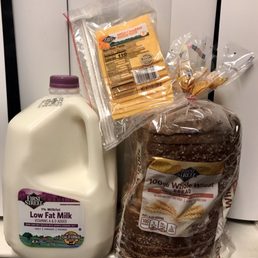 Smart & Final Extra's name brand First Street, 1% milk $2.59, mild cheddar sliced cheese $2.39, 100% whole wheat bread only $1.99!