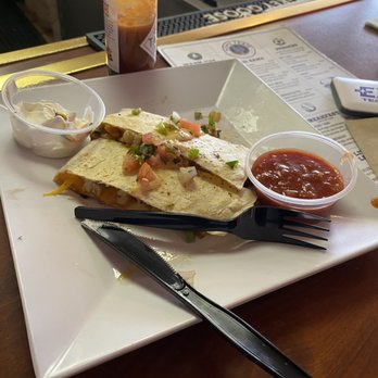 Home Team Sports - Quesadilla was bar desperation food but met the need. - Airport Lounges Near Me - Lubbock, Texas