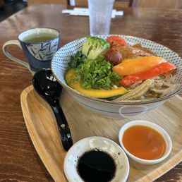 Vegetarian Spicy Vegan Ramen with chili oil and black garlic sauce - green tea