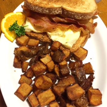 Sunrise Grill - egg and bacon sandwich on toast, with potatoes - American Near Me - Boone, North Carolina Sunrise Grill - egg and bacon sandwich on toast, with potatoes - American Near Me - Boone, North Carolina