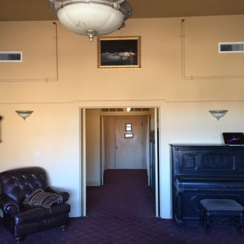 Jerome Grand Hotel - The main room in the Grand Suite. Piano is not functional (too haunted). - Hotels Near Me - Jerome, Arizona