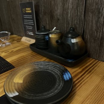 Zen Ramen - a table setting with teapots and plates - Ramen Near Me - Maplewood, Minnesota Zen Ramen - a table setting with teapots and plates - Ramen Near Me - Maplewood, Minnesota