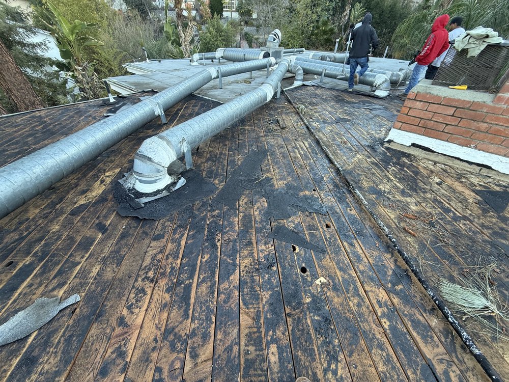 Slide of AAA Roofing Services