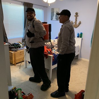 Primate Pest Elimination - Luis giving thumbs up and Eric helping, inside my sons room. - Pest Control Near Me - Valencia, California