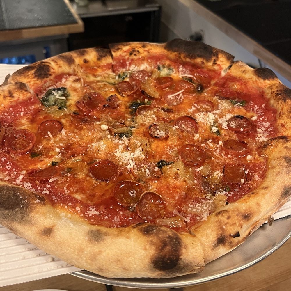 Cornelly - Hornet Honey Pizza - Italian Near Me - Seattle, Washington Cornelly - Hornet Honey Pizza - Italian Near Me - Seattle, Washington