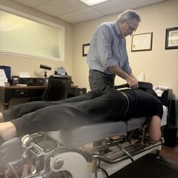 Rick Sears, DC - Sears working his magic with massager on back