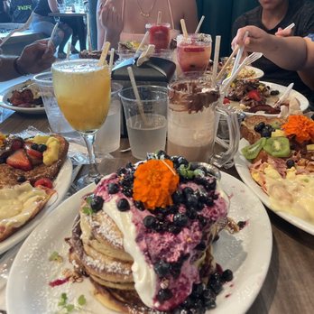 Bistro Cafe - Blue berry and creams pancake Mimosas Mocha - Breakfast & Brunch Near Me - Miami, Florida Bistro Cafe - Blue berry and creams pancake Mimosas Mocha - Breakfast & Brunch Near Me - Miami, Florida