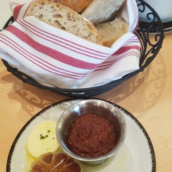 Midtown Table - House Bread with roasted garlic, butter and olive tapenade - Italian Near Me - Jacksonville, Florida Midtown Table - House Bread with roasted garlic, butter and olive tapenade - Italian Near Me - Jacksonville, Florida