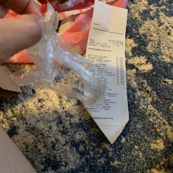 City Barbeque - a person cutting a piece of paper with a pair of scissors - Barbeque Near Me - Lexington, Kentucky