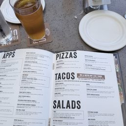 Part of their menu with a nice cold house blonde beer Part of their menu with a nice cold house blonde beer