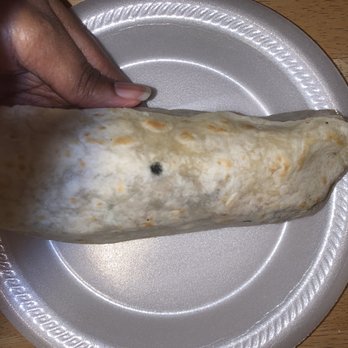 Tacos Arandas - a hand holding a burrito - Mexican Near Me - Los Angeles, California Tacos Arandas - a hand holding a burrito - Mexican Near Me - Los Angeles, California