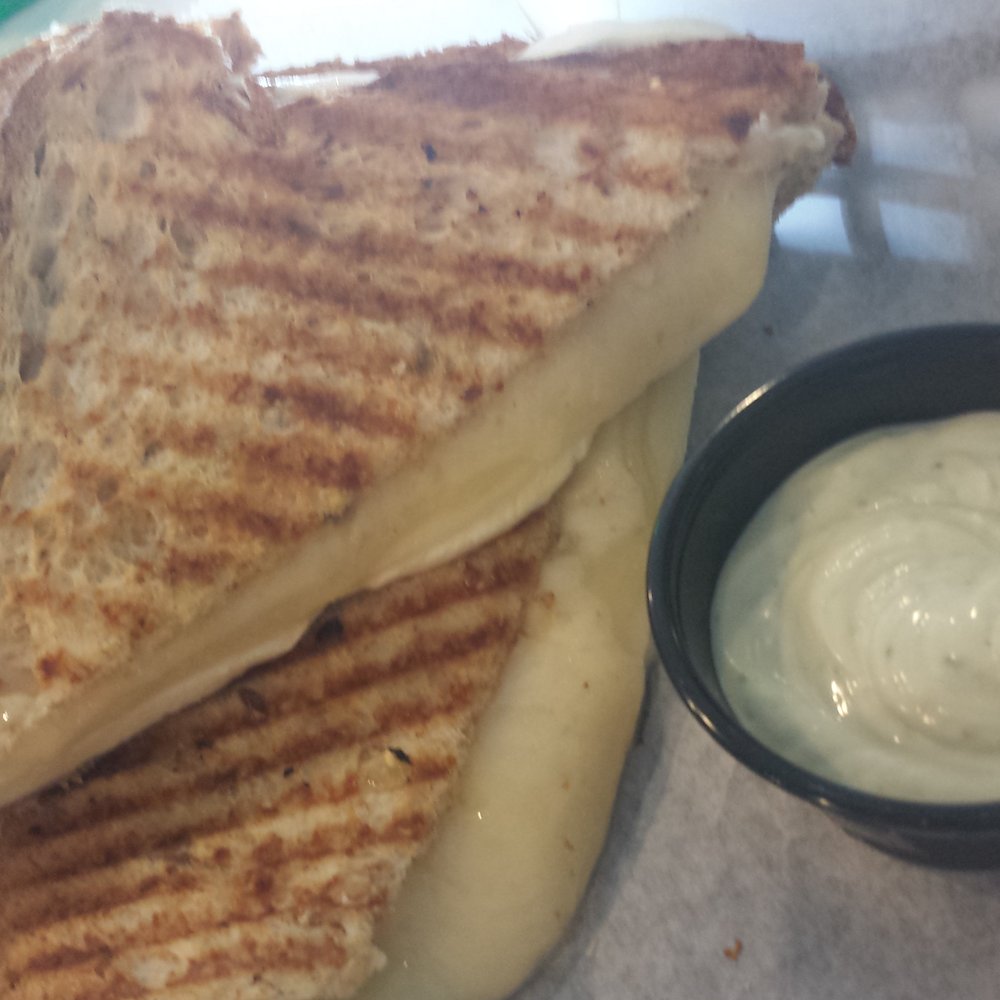Capriccio Authentic Italian - Quattro formaggi panini with little mystery sauce - Italian Near Me - Doral, Florida Capriccio Authentic Italian - Quattro formaggi panini with little mystery sauce - Italian Near Me - Doral, Florida