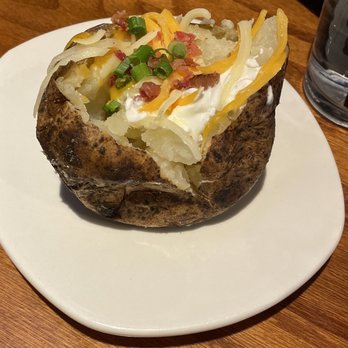 Outback Steakhouse - Fully loaded Baked potato - Steakhouses Near Me - Shenandoah, Texas