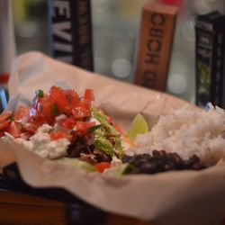 What Cheer Tavern - Carnitas Tostada with rice and black beans!