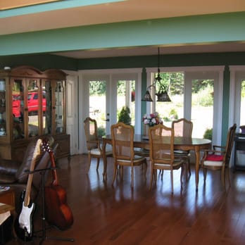 Two Eagles Lodge - Our dining room where breakfast is served in the cooler weather - Vacation Rentals Near Me - Union Bay, British Columbia