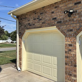 Affordable Brick Repair - Completed garage doors. Darker mortar joint because it was wet at time of picture - Masonry/Concrete Near Me