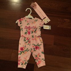 Buy Buy Baby - $5 outfit and $3 headband. Great clearance section.
