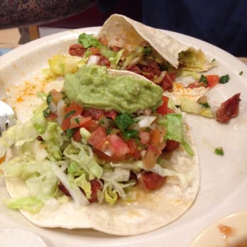 Three Amigos - Why yes. Those are chorizo sausage tacos. And he said they were good - Mexican Near Me - Stoneham, Massachusetts