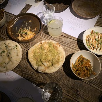 Kricket Soho - A spread of their breads (pistachio and date, and garlic and coriander). - Indian Near Me - London, XGL Kricket Soho - A spread of their breads (pistachio and date, and garlic and coriander). - Indian Near Me - London, XGL