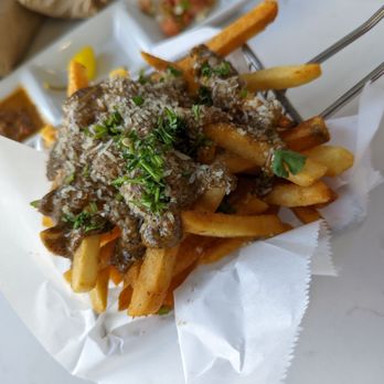Bites & Bashes Cafe - Crack fries! Spread the sauce out evenly and you'll be happier! - Cafes Near Me - Lomita, California