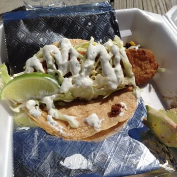Shark Bite - Fish taco with cilantro sauce! Yum! - Food Trucks Near Me - Navarre, Florida Shark Bite - Fish taco with cilantro sauce! Yum! - Food Trucks Near Me - Navarre, Florida